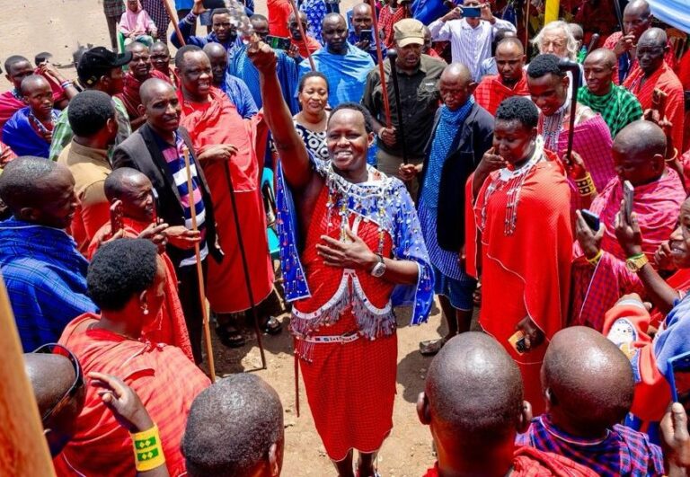 Triumphant Maasai man