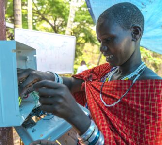 Maasai woman working as an electrician